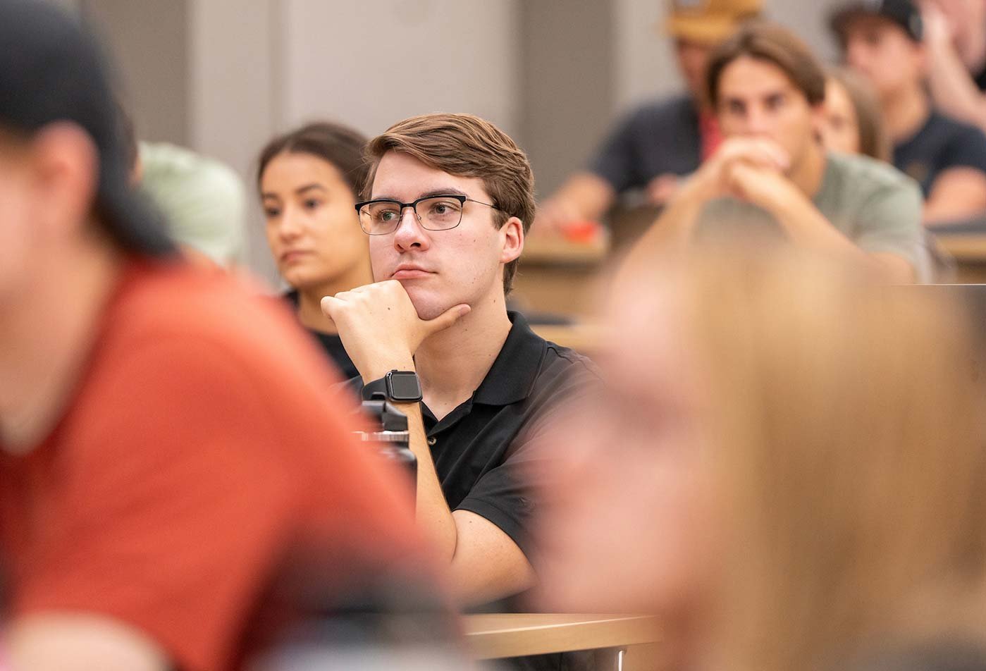 A lecture hall full of attentive listeners showcases engagement in ASU's BA in Business (Global Leadership) program.