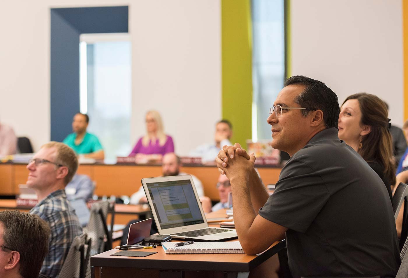 A dynamic classroom discussion showcases collaborative learning in ASU's W. P. Carey MBA - Custom Corporate Program.