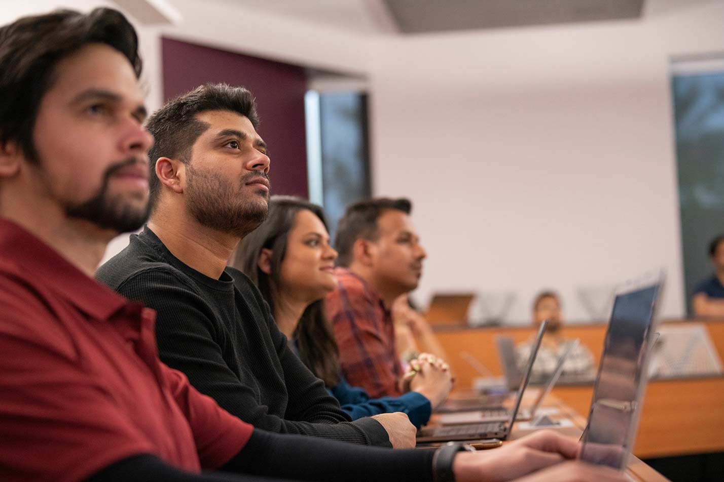 Students listen attentively to a lecture in ASU's Information Systems Management degree.