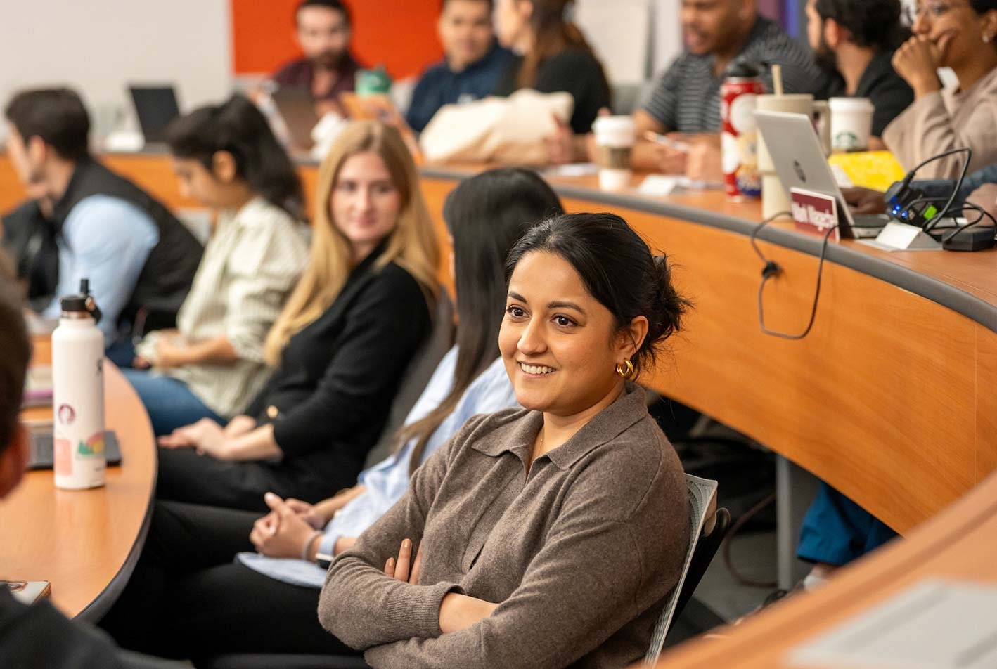 A collaborative classroom buzzes with dynamic discussion, reflecting the nature of ASU's MS in Entrepreneurship and Innovation program.