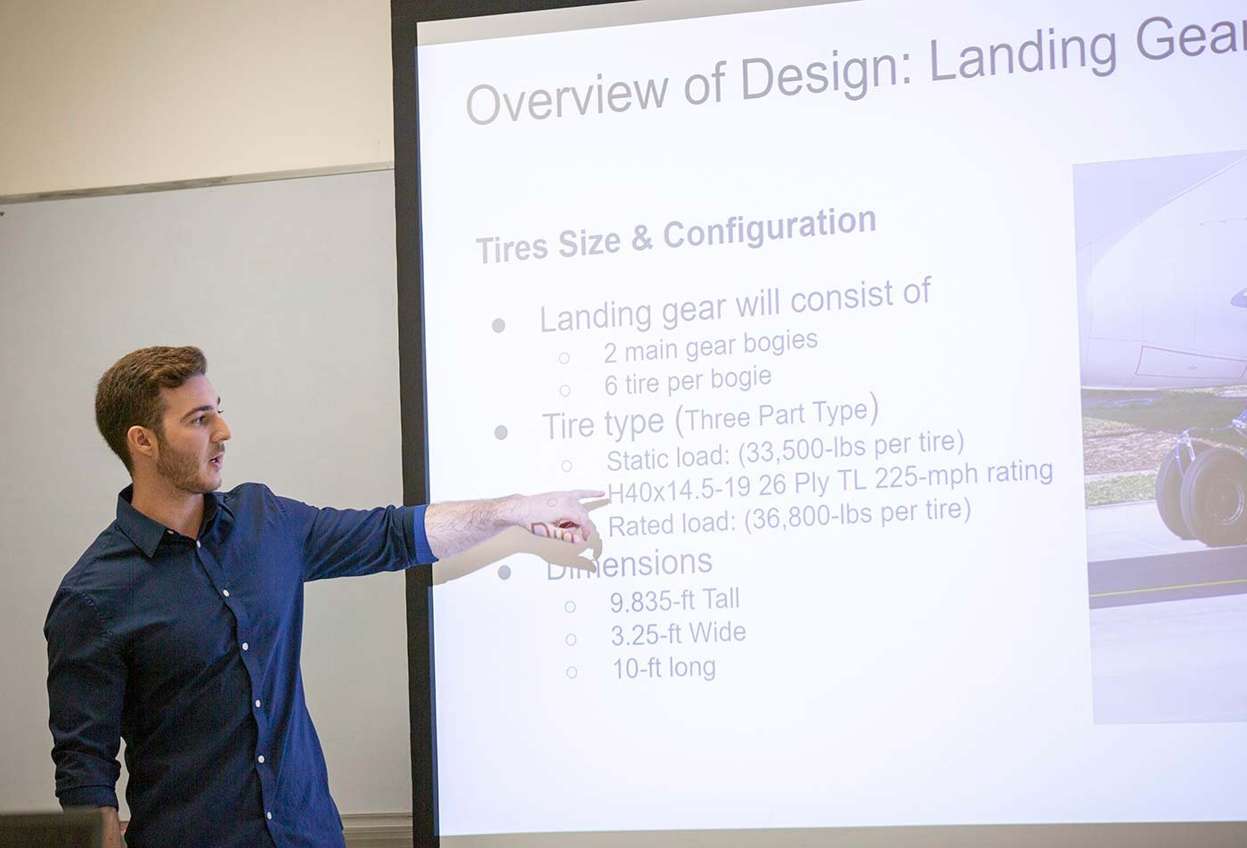 A student presents concepts of landing gear design, highlighting the knowledge earned in ASU's Aerospace Engineering degree.
