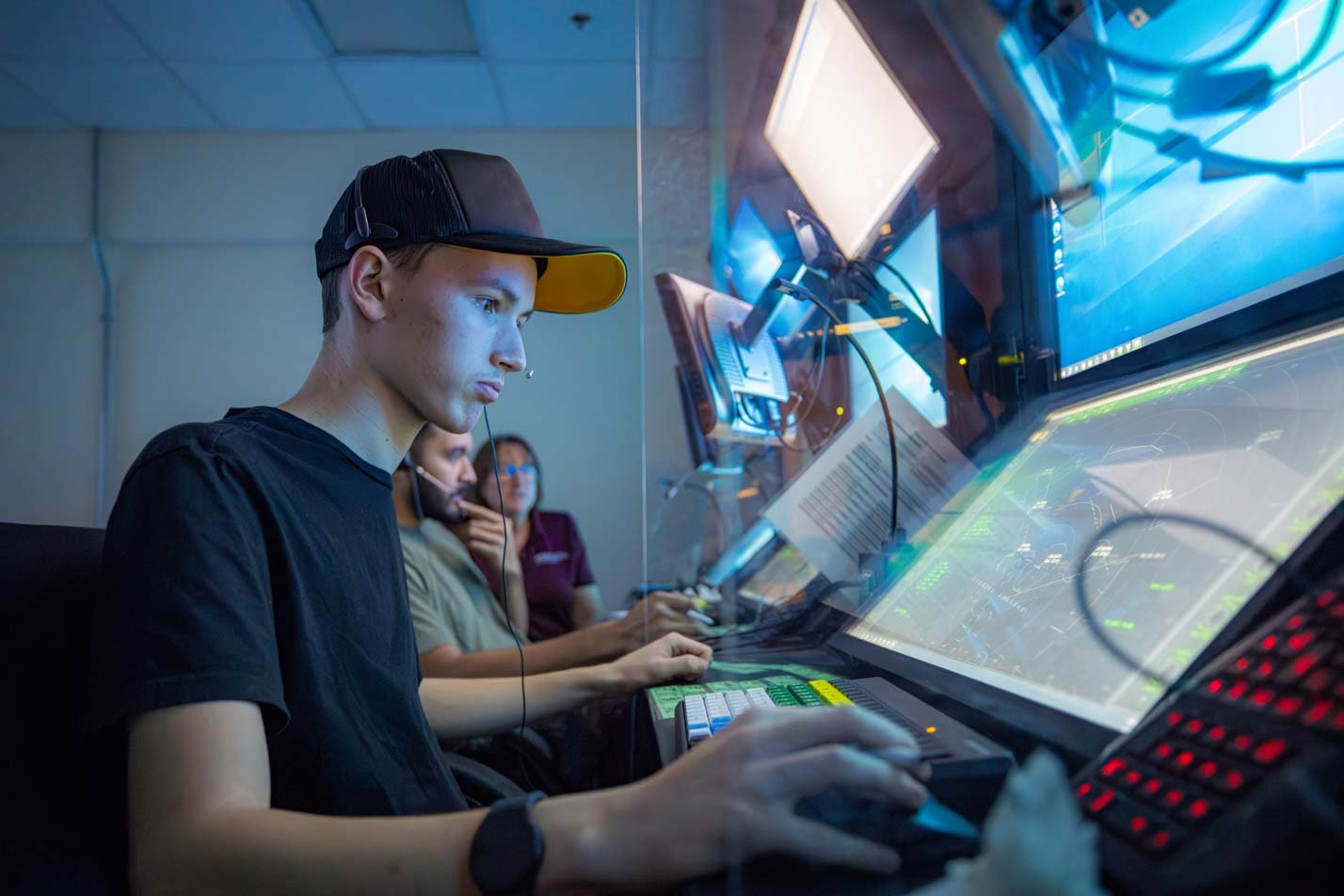 Students engage with an air traffic control simulator, representing hands-on training in ASU's Aeronautical Management Technology (Air Traffic Management) program.