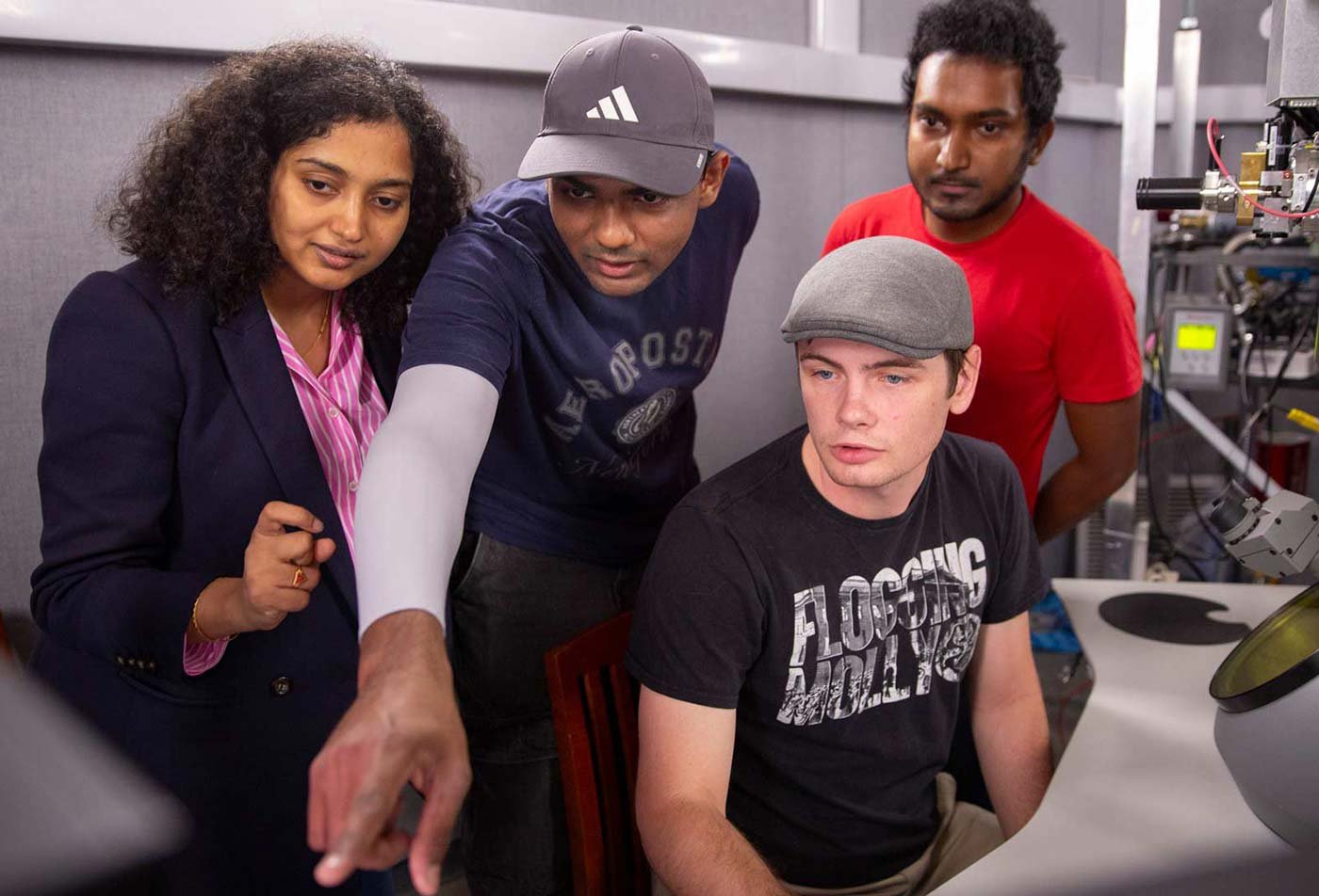 Students collaboratively analyze data in a lab, showcasing the teamwork central to ASU's Chemical Engineering, PhD program.
