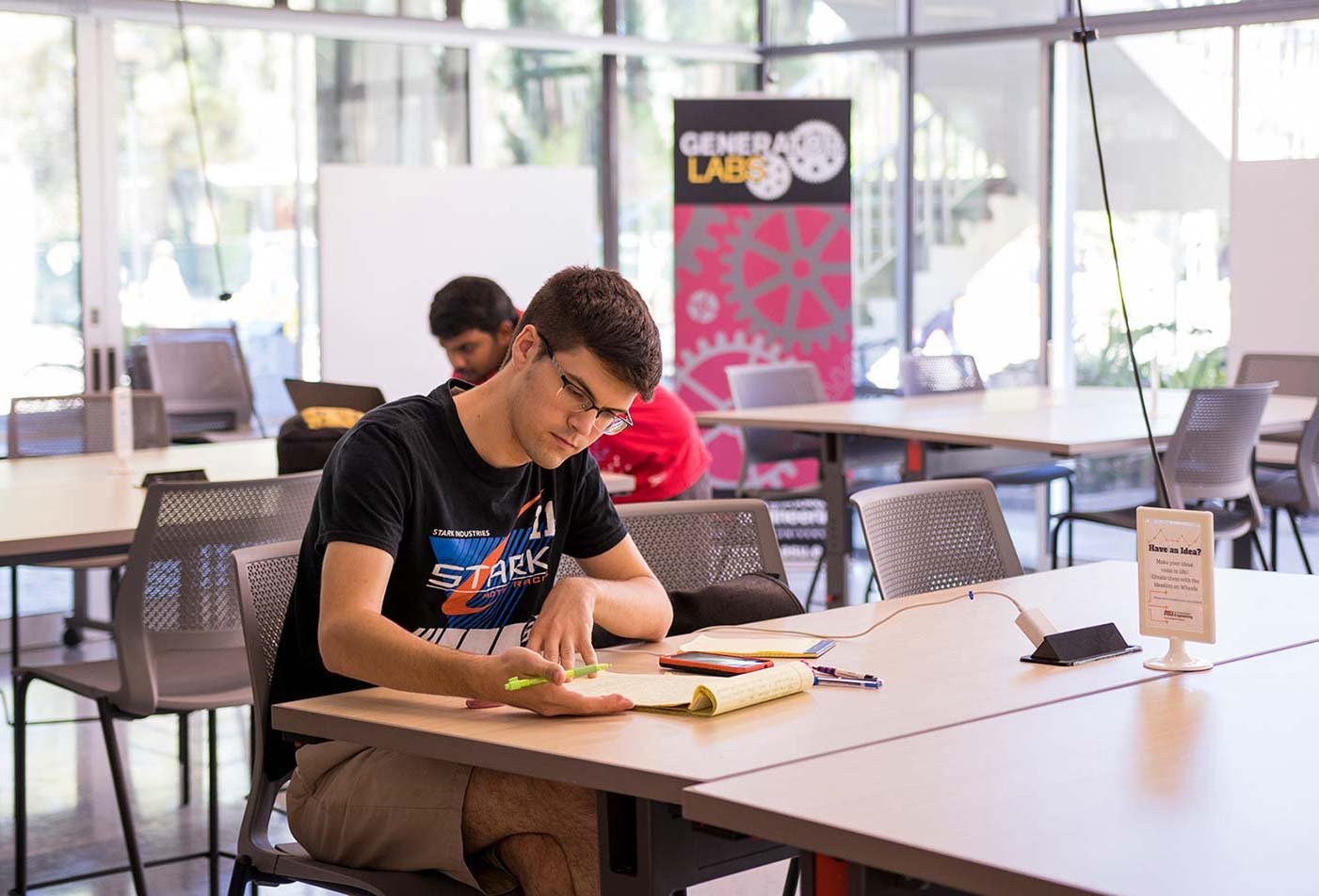 A student takes notes in a learning space in ASU's Data Science, Analytics and Engineering (Mechanical and Aerospace Engineering), MS degree.