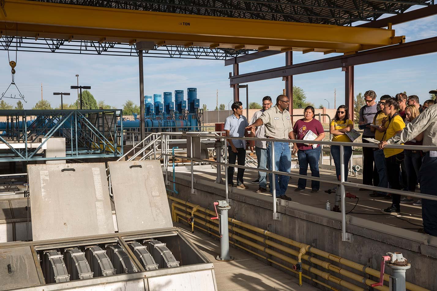 Students tour a water treatment facility, exploring sustainable resource systems in ASU's Environmental and Resource Management, MS program.