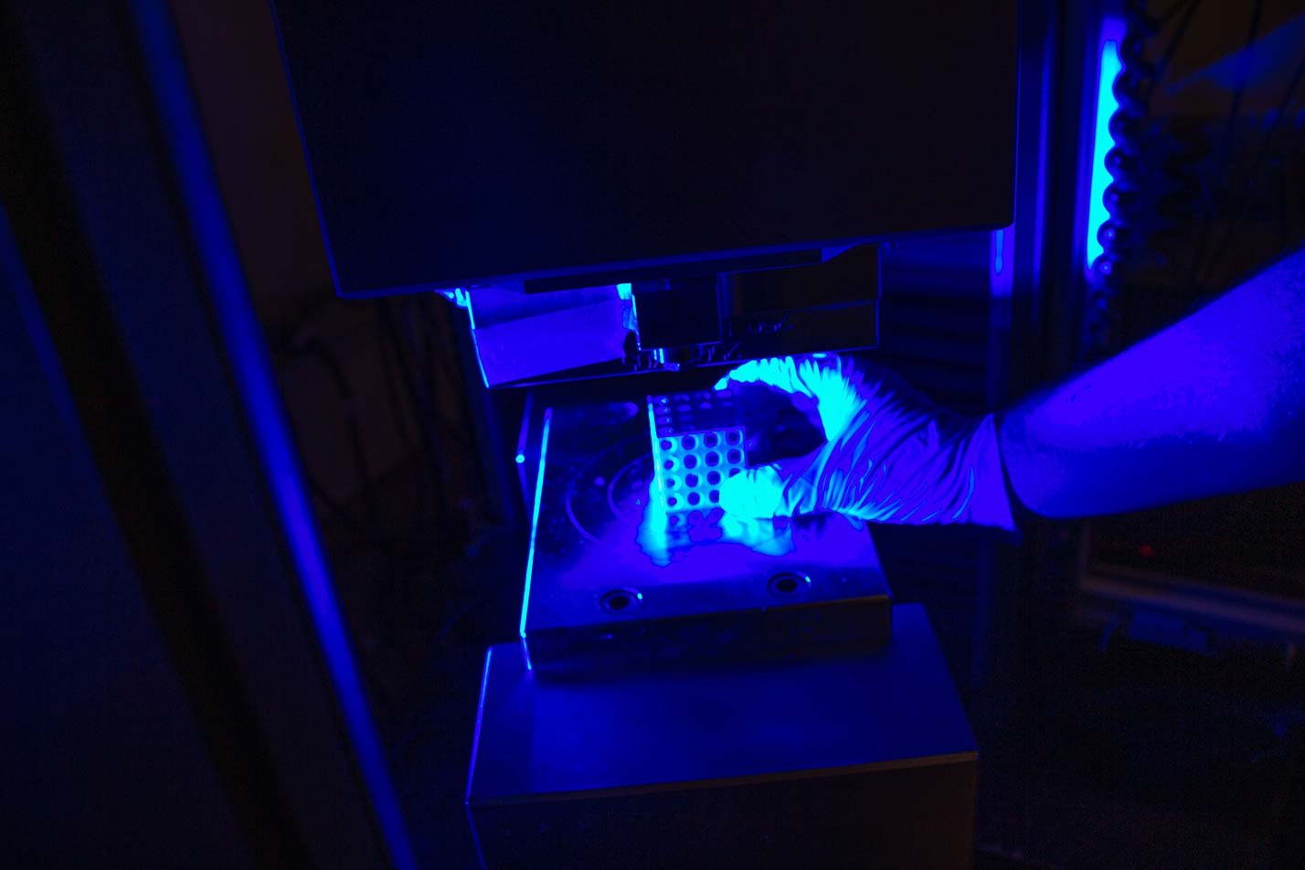 Researchers develop advanced materials in a laboratory, highlighting hands-on experimentation in ASU's Manufacturing Engineering, PhD program.