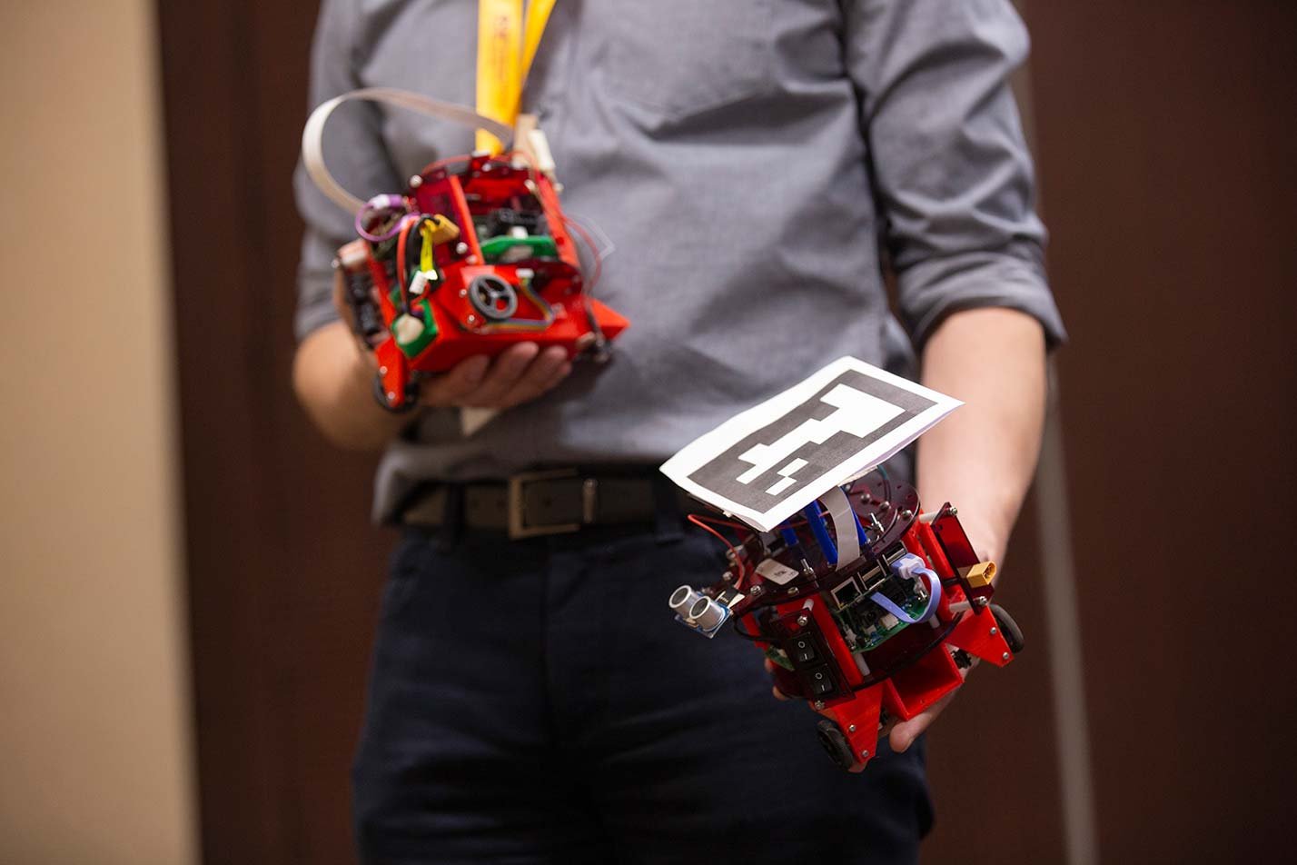 Students demonstrate autonomous robots, showcasing robotics in ASU's Robotics and Autonomous Systems (Artificial Intelligence), MS program.