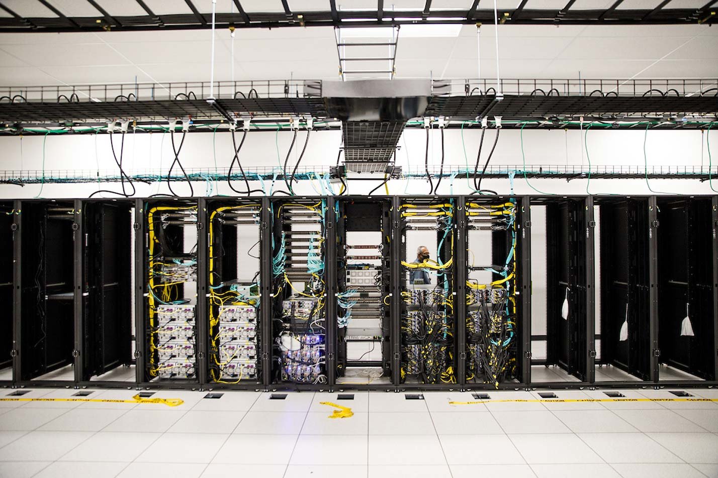 Rows of servers in a data center showcase computing infrastructure supporting ASU's Software Engineering (Data Science), MS program.
