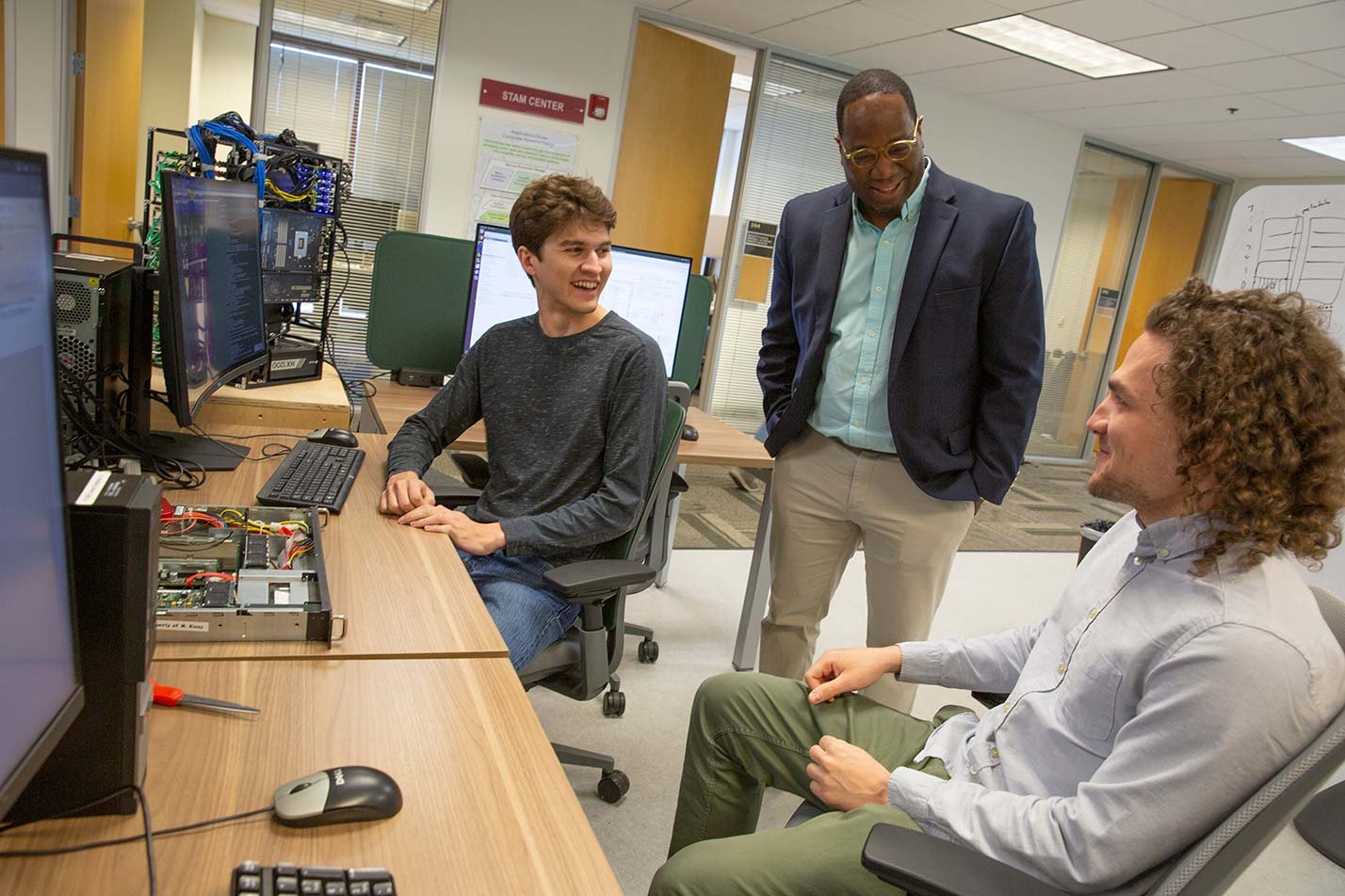 Students analyze electronic hardware with faculty guidance in ASU's Sensor Signal and Information Processing (Graduate Certificate).
