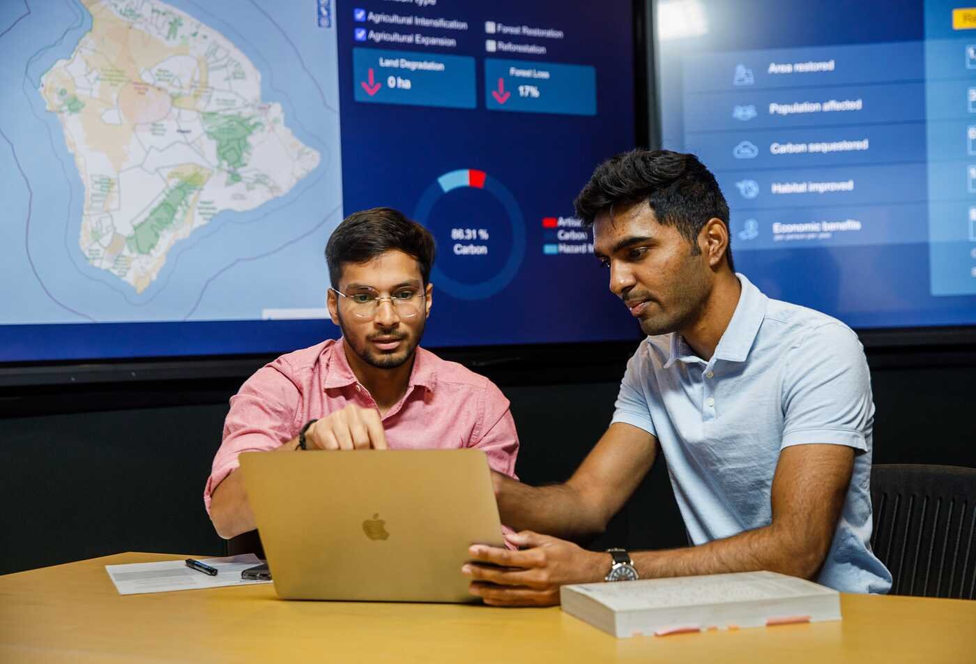 Arizona State University graduate students from the Rob Walton College of Global Futures engage in research and data science through Decision Theater.