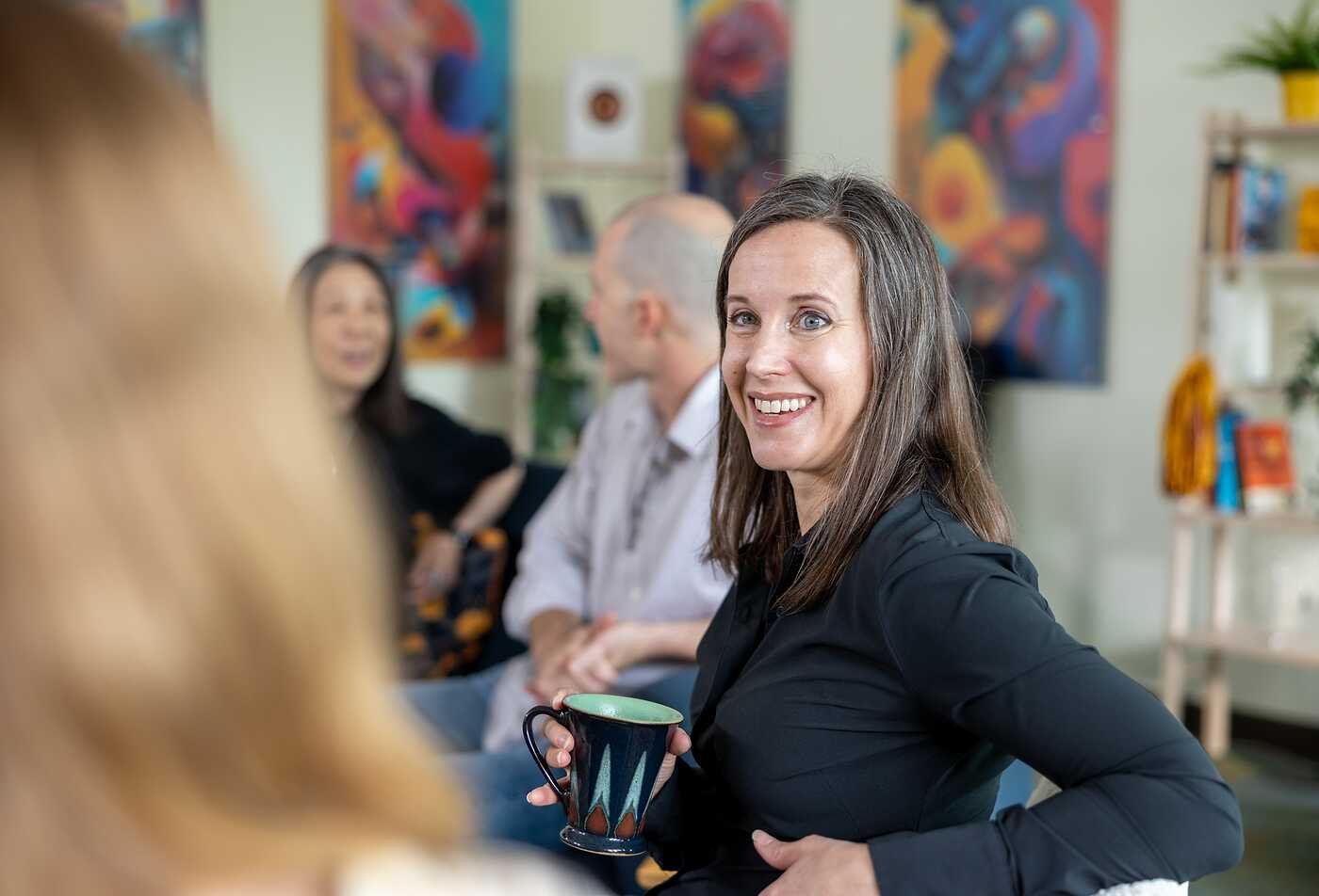 Arizona State University doctoral student from the Rob Walton College of Global Futures engaging in a conversation at ISTBX on the Tempe Campus.