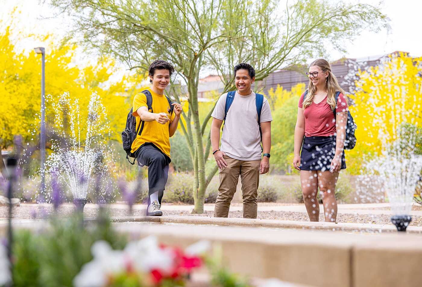 ASU Futures and Design students discuss innovation in a colorful outdoor environment.