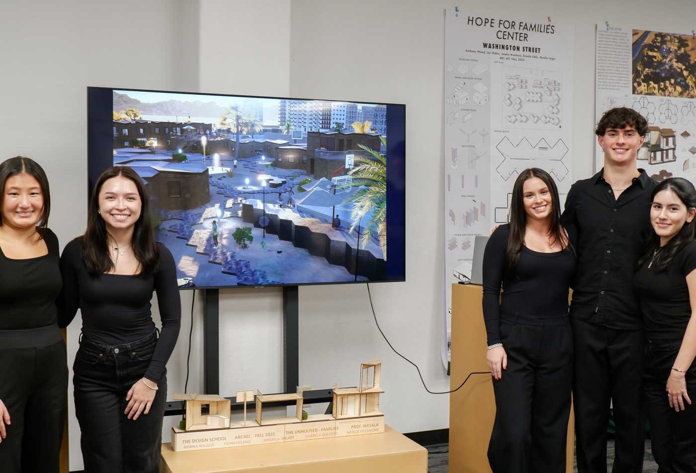 Students present a landscape architecture project, showcasing hands-on learning in the minor in Architectural Studies.