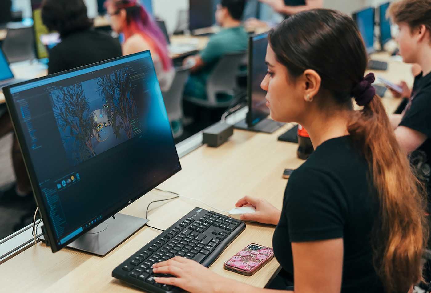 A student edits animated footage, showcasing hands-on learning in the minor in Film and Media Production.