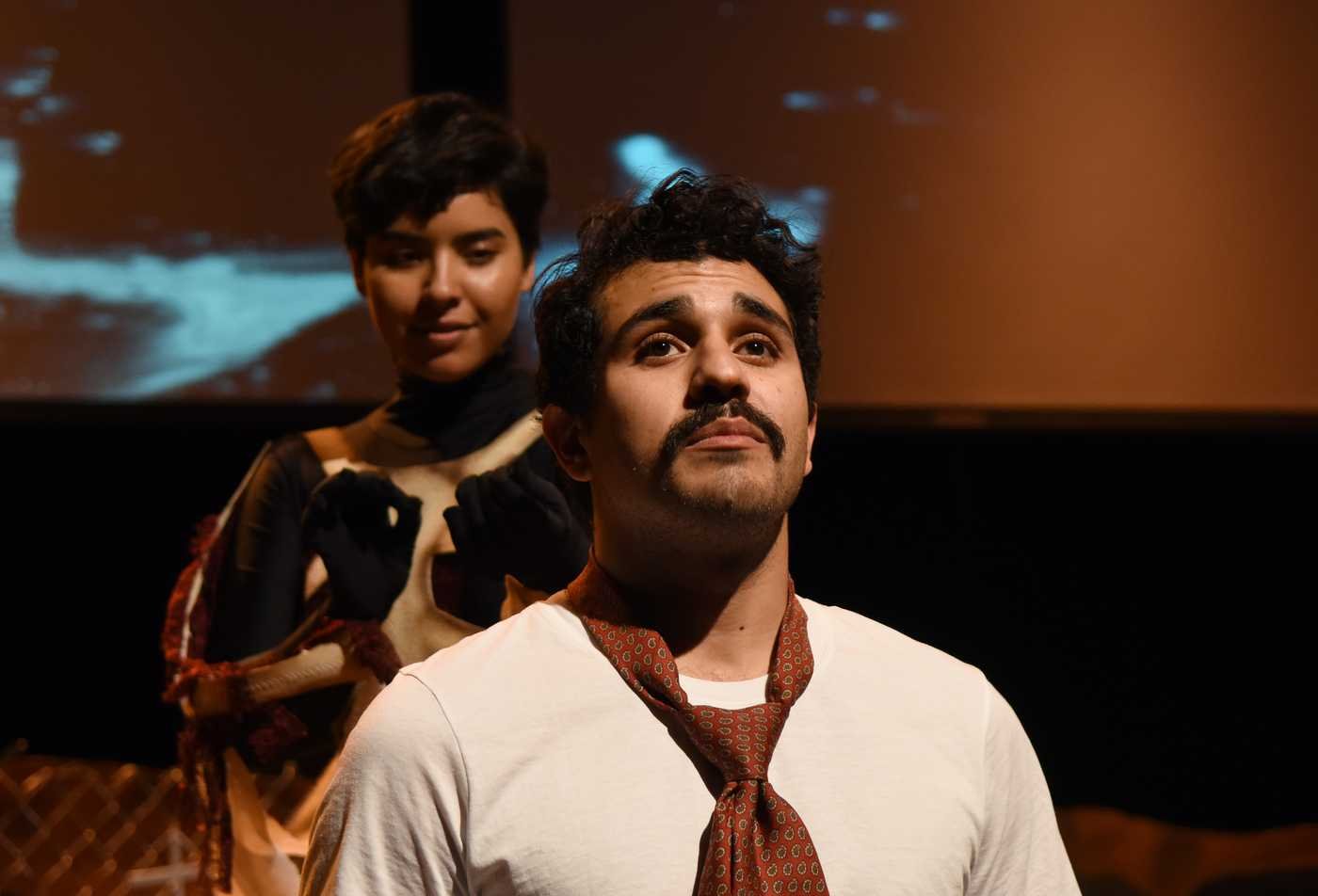 Actors perform together on a stage, showcasing hands-on learning in the Theatre (Theatre and Performance of the Americas), PhD.