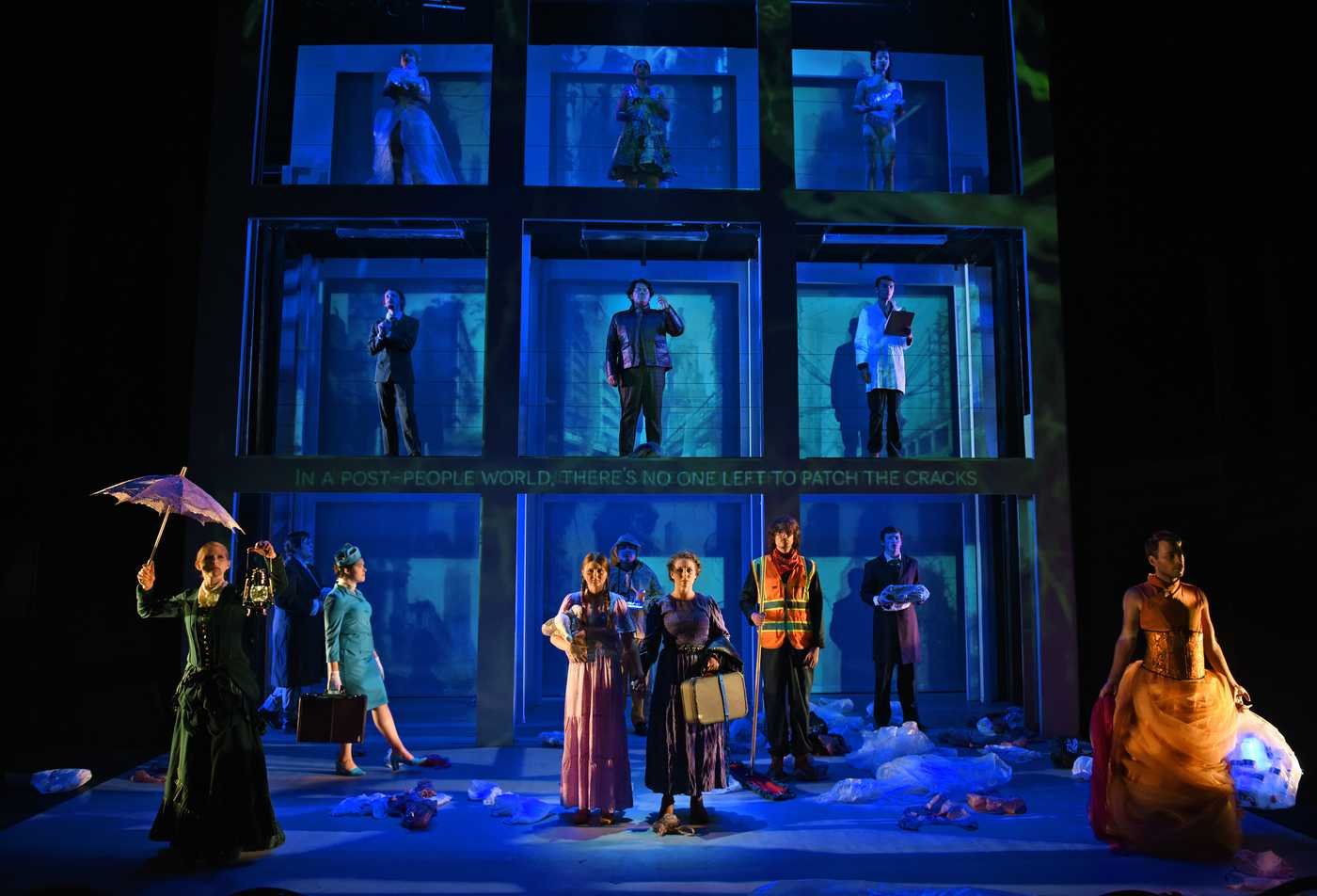 A professional theater performance displays digital media as part of the set, symbolizing the field of the Theatre (Interdisciplinary Digital Media), MFA