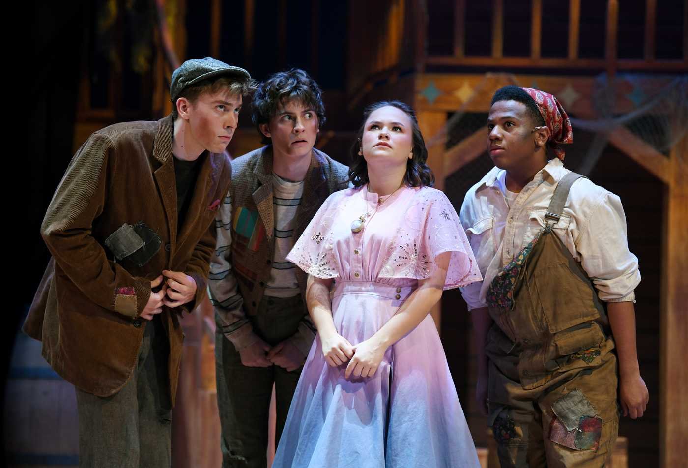 Students perform on a stage, demonstrating the field in the minor in Theatre.