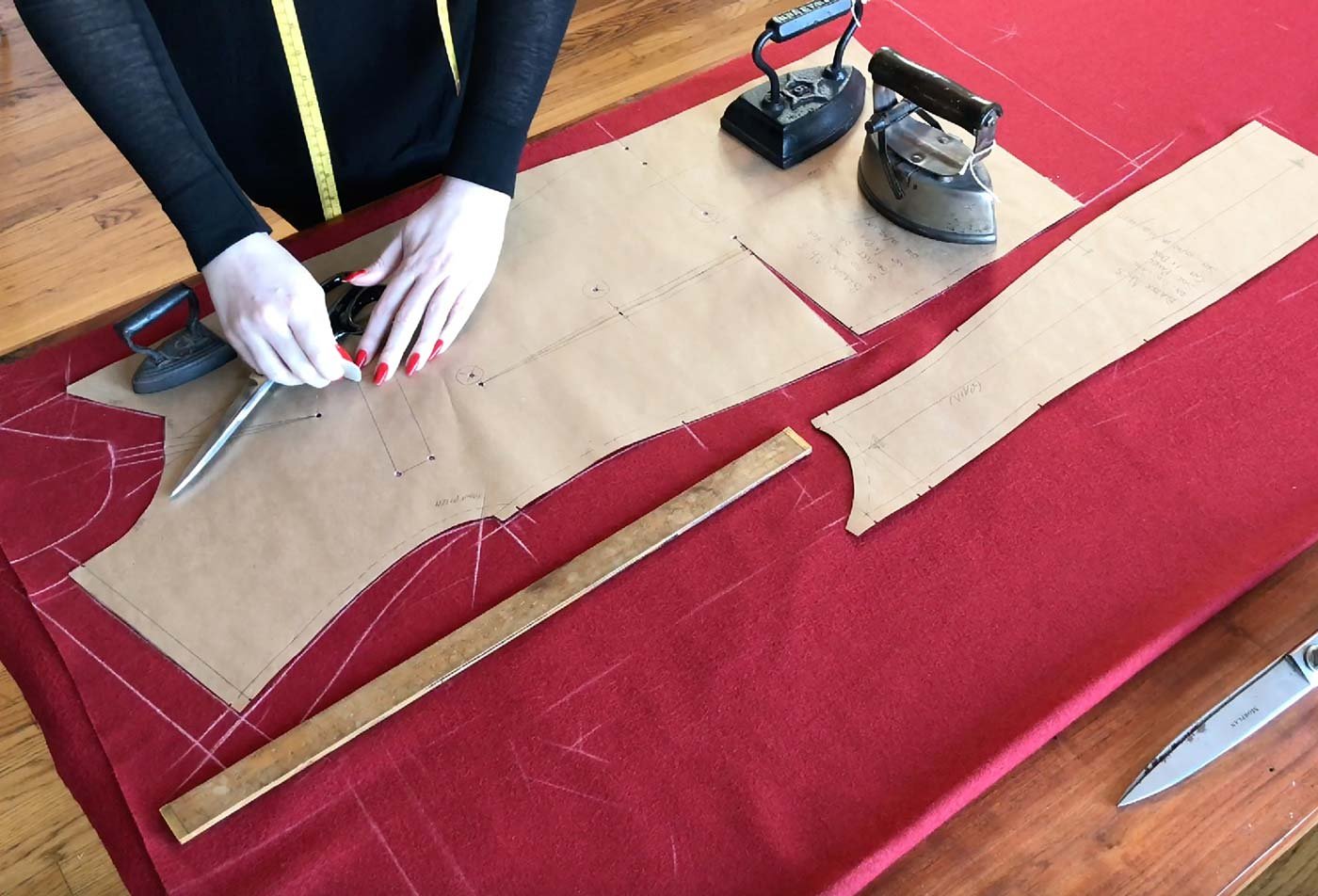A student tailors a jacket, showcasing hands-on learning in the certificate in The Art of Bespoke Tailoring.
