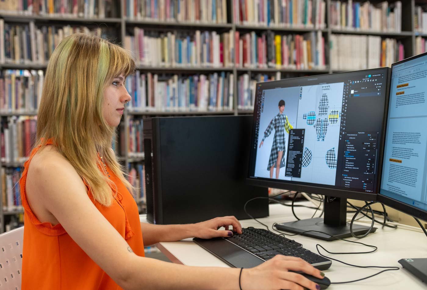 A student uses the CLO 3D system on a computer, showcasing the field explored in the certificate in CLO 3D Virtual Fashion Design.