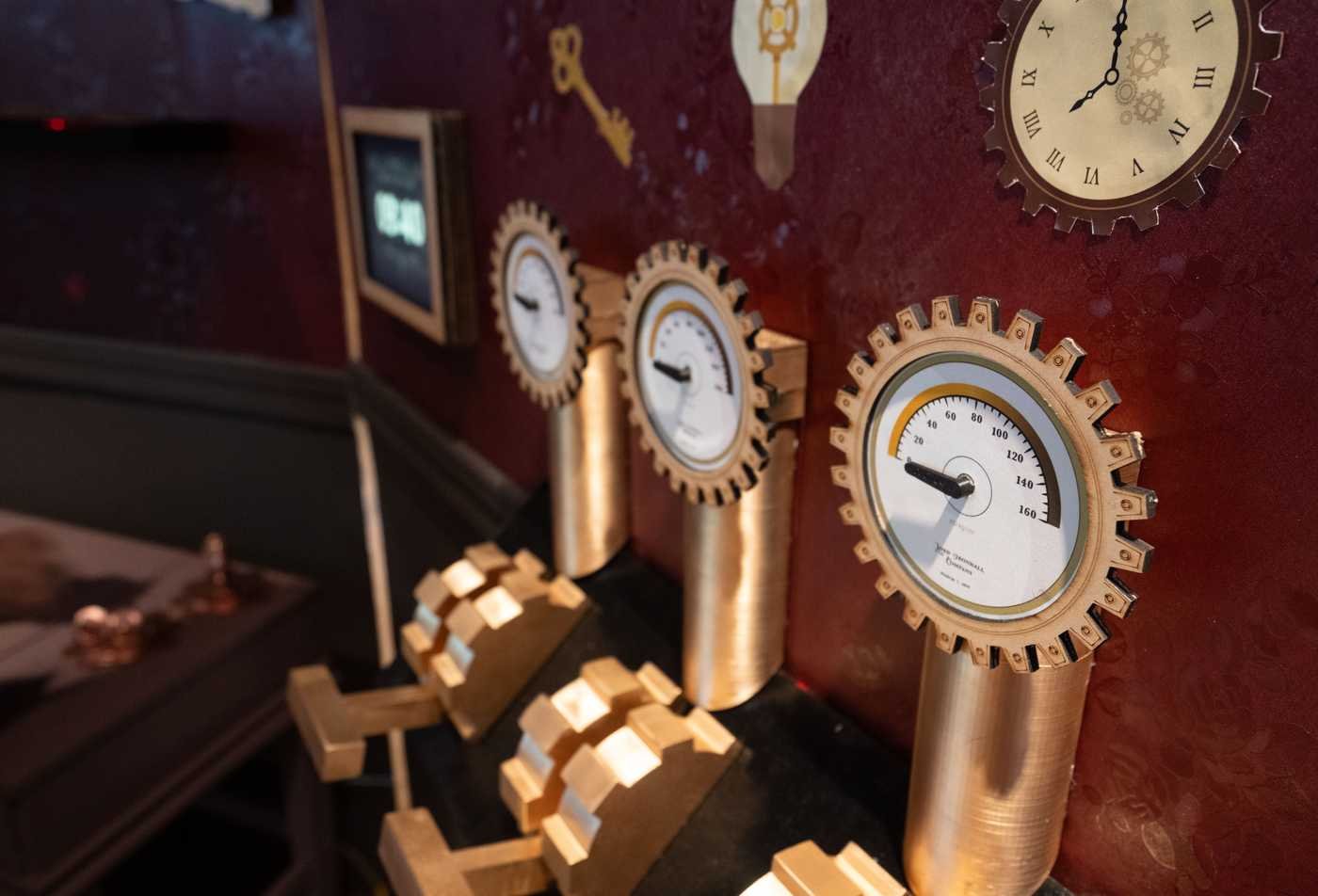 A machine with temperature readings and levers are part of a designed escape room experience, showcasing the field explored in the BA in Media Arts and Sciences (Design).