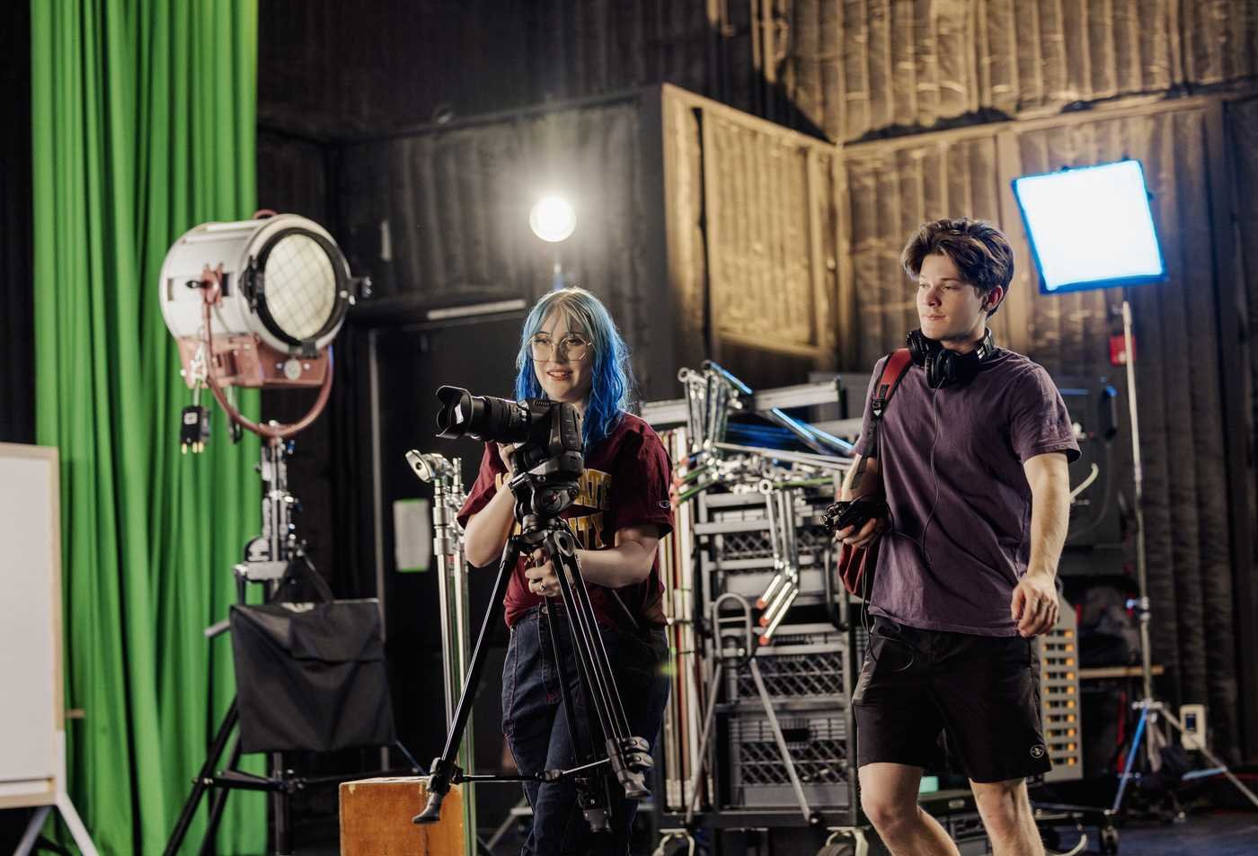 Students film a scene on a professional set, demonstrating the field explored in the BFA in Film and Media Production.
