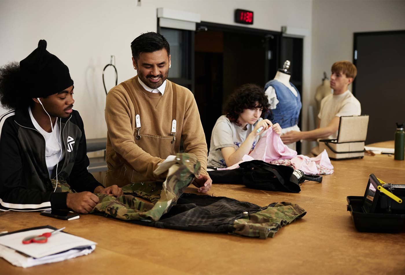 Students create garmets, demonstrating hands-on learning in the BA in Fashion (Design).