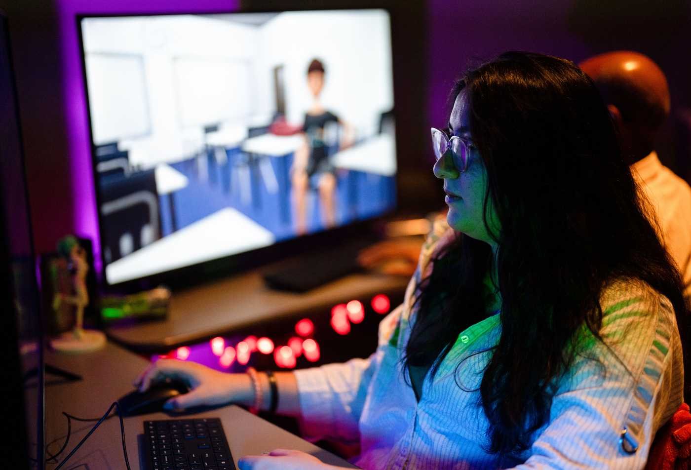 Students work on a 3D game together, showcasing hands-on work in the BS in Game Design.