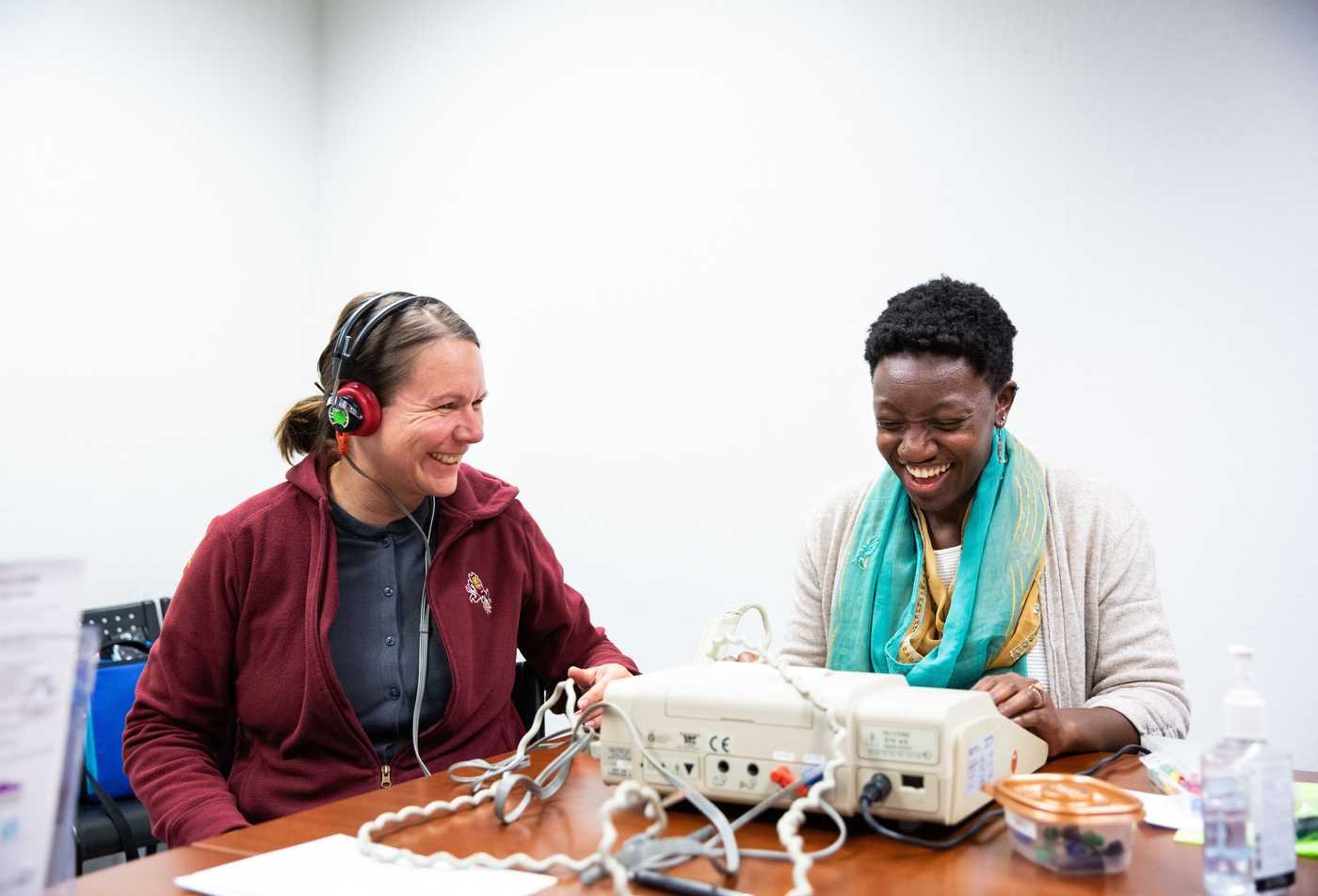 A student conducts a hearing test with a paricipant, demonstrating research explored in the minor in Speech and Hearing Science