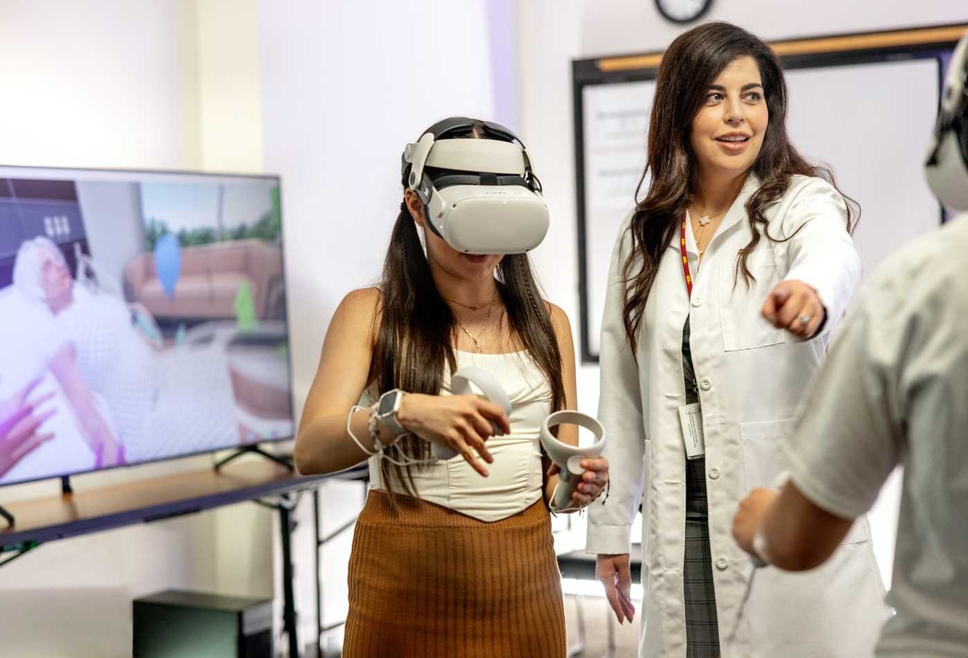 A student explores a medical environment through VR, showing hands-on learning in the BS in Medical Studies.