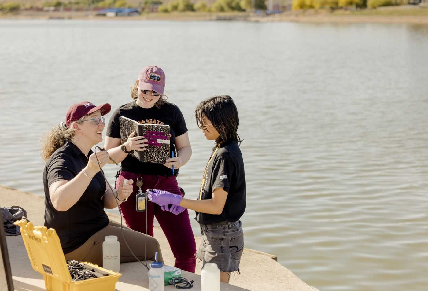 Chemistry students and faculty collect samples in the field, demonstrating hands-on learning in the BS in Chemistry (Environmental Chemistry).