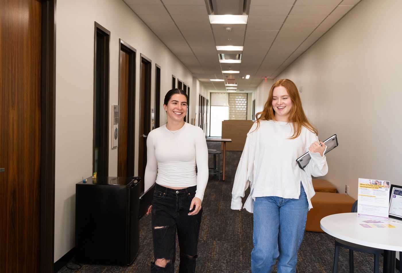 Two students walk together on campus, reflecting on relationships in ASU's Family and Human Development, BS program.