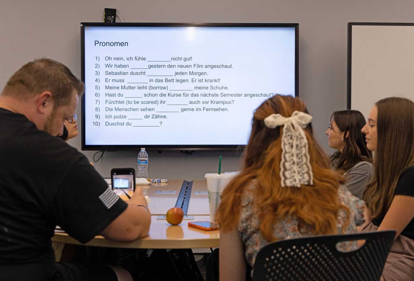 Students study German pronouns in class, developing language skills in ASU's German, BA program.