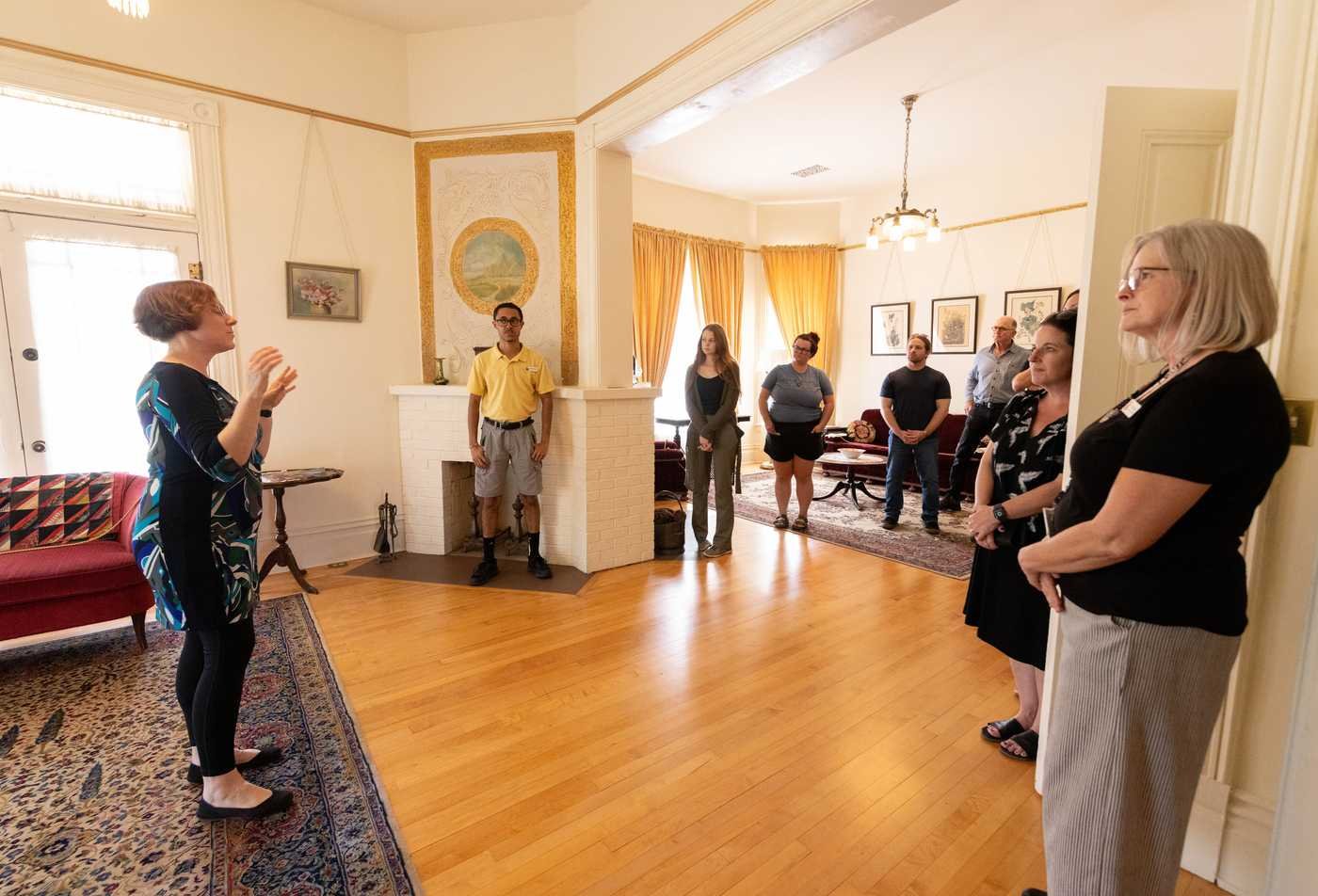 A guide speaks to a group in a historic home, reflecting teaching and history in ASU's History (Secondary Education), BA program.