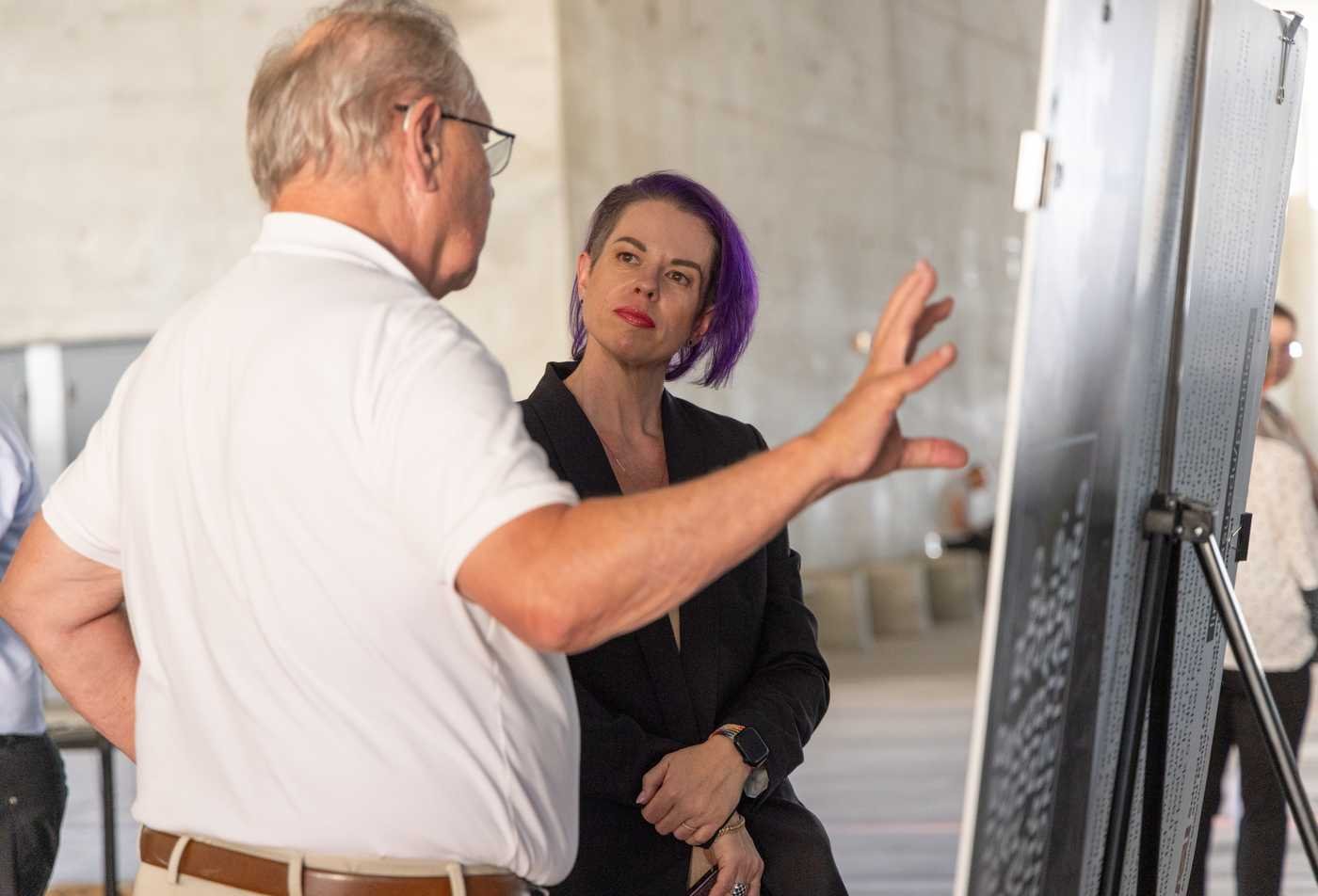 A student and a professor engaged in a deep discussion, highlighting the connections made in the certificate in Human Rights.