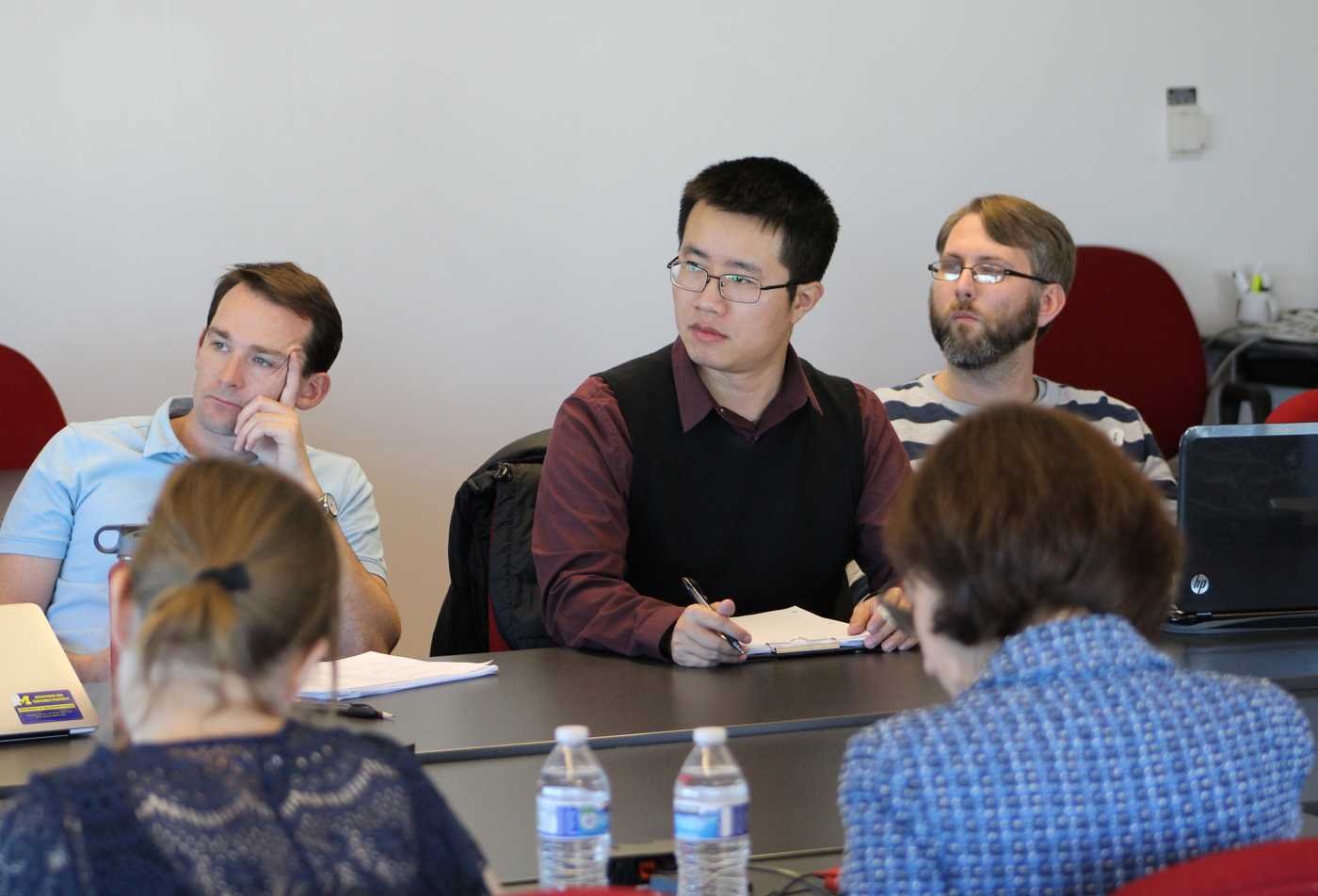 Students listen together during a class, growing in their understanding in policy in the certificate in Latino Politics and Policy.