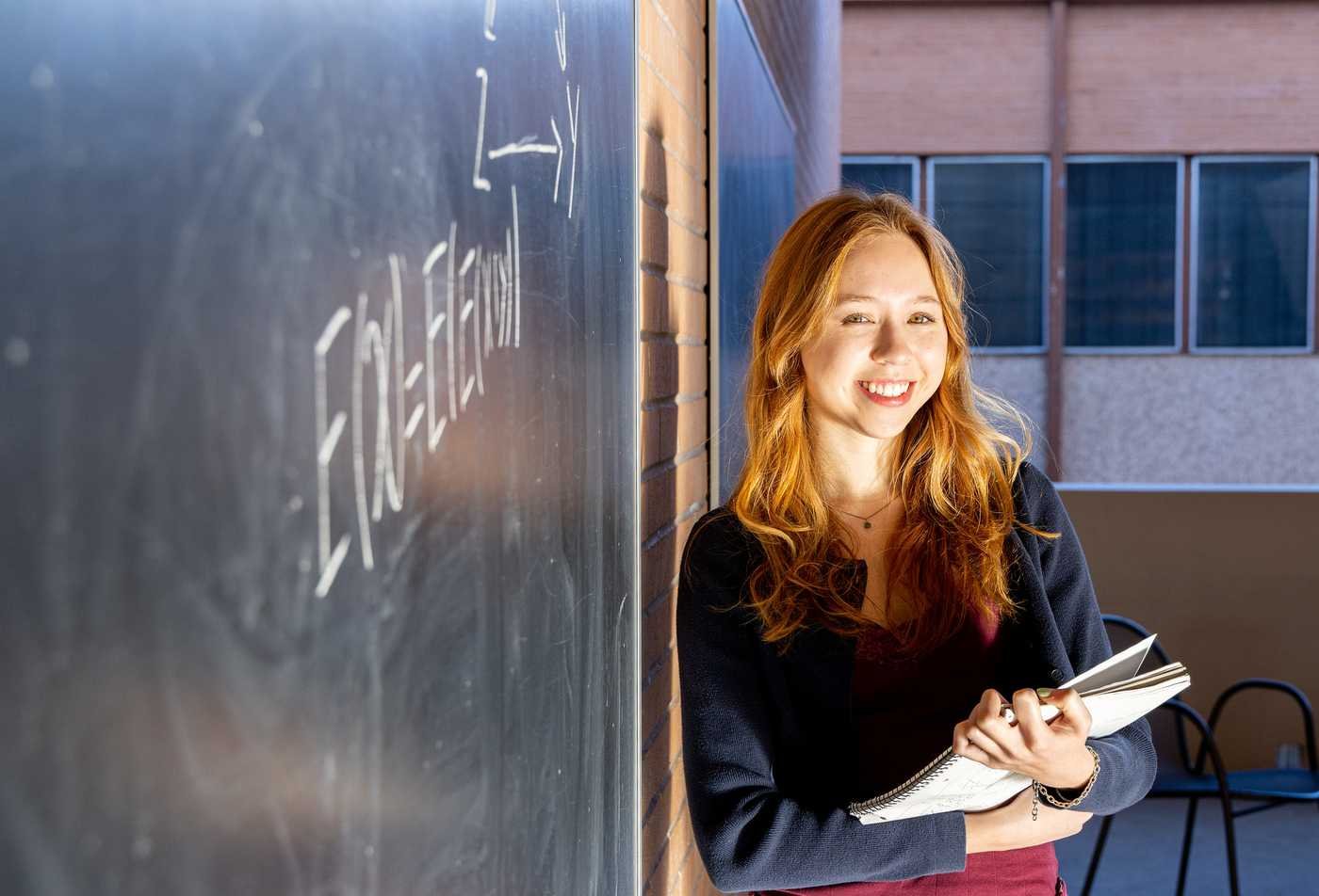 An instructor presents data visualizations, demonstrating quantitative analysis in ASU's Mathematics, BS program.