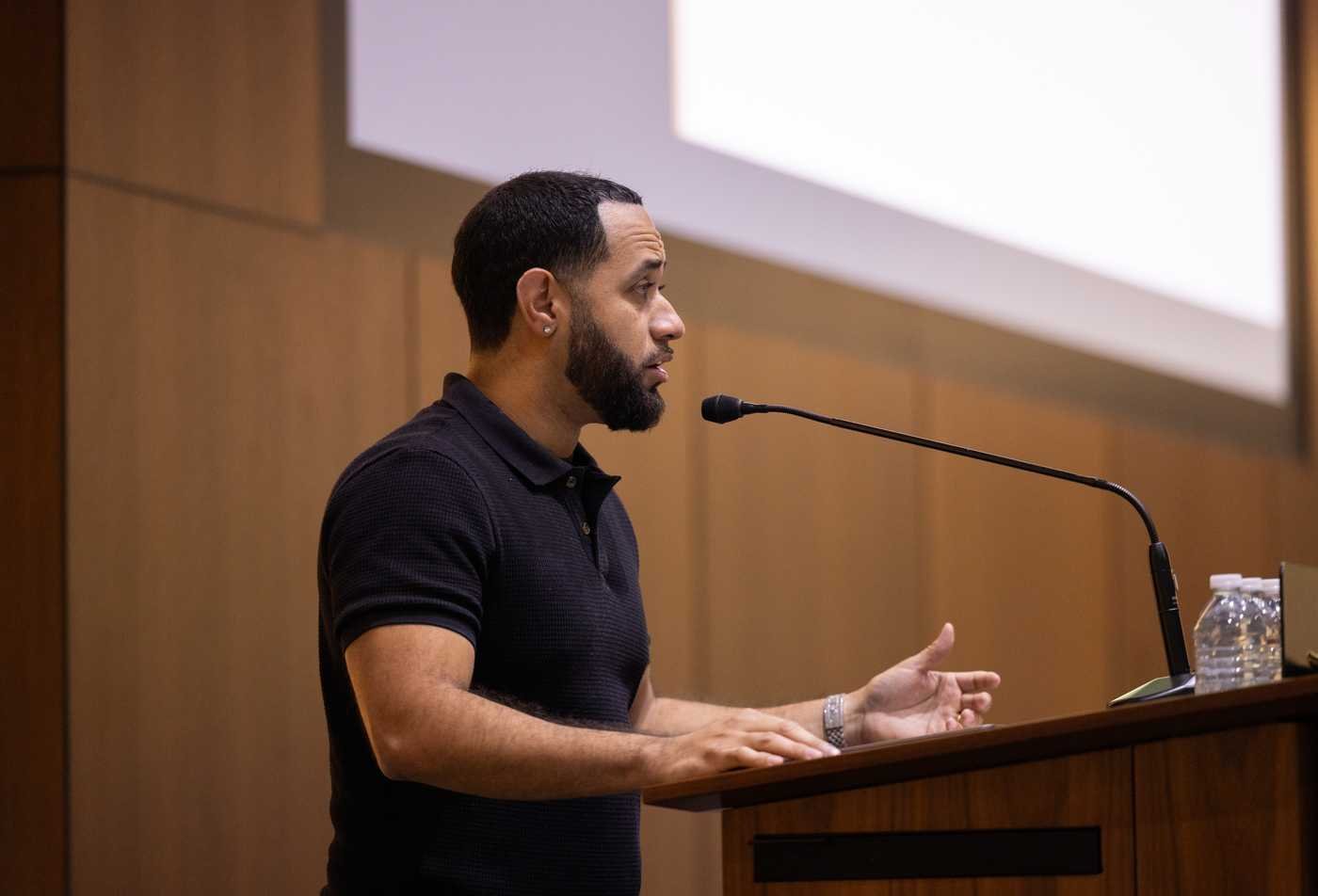 A speaker addresses an audience, connecting public policy and economics in ASU's Politics and the Economy, BS program.