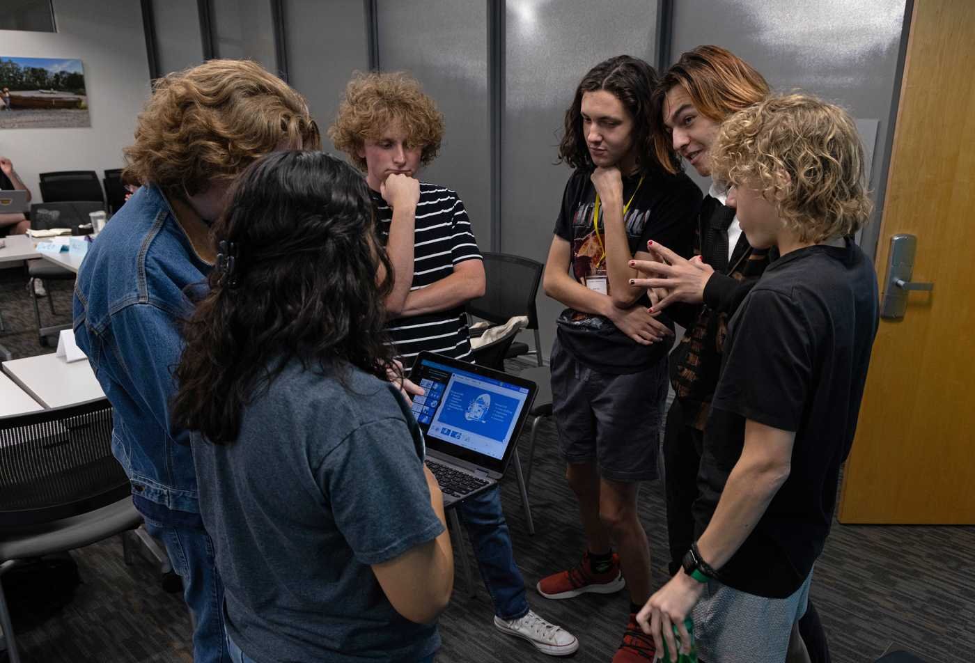 Students discuss philosophy together, forming connections in the Philosophy, MA.