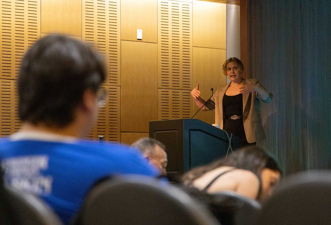 A speaker addresses an audience, exploring ideas in ASU's Philosophy (Science, Nature and Mind), BA program.