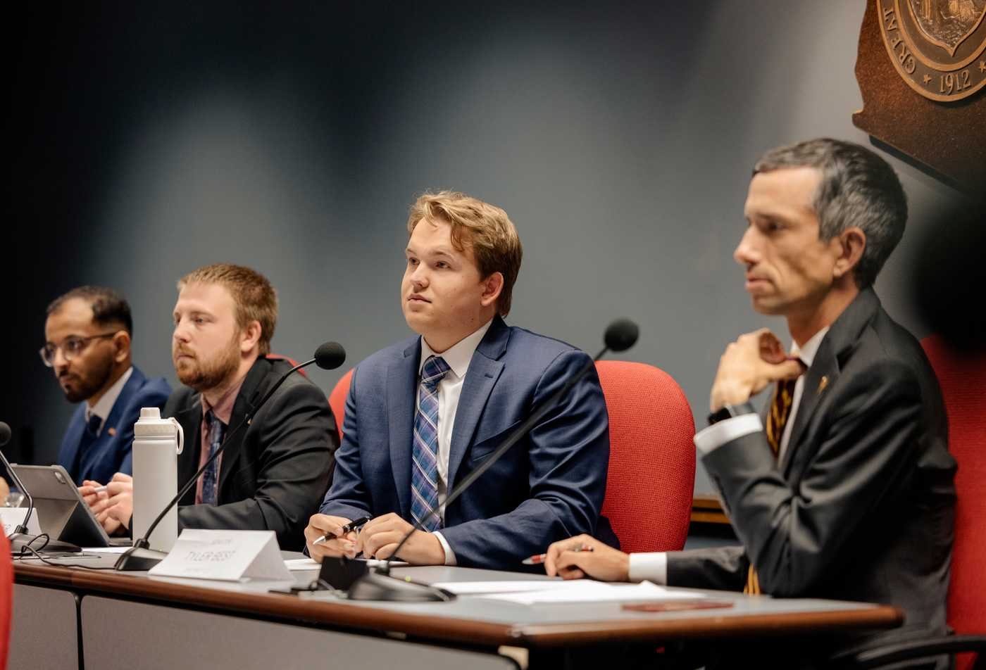 A panel discusses policy in a formal setting, exploring governance in ASU's Political Science, BS program.