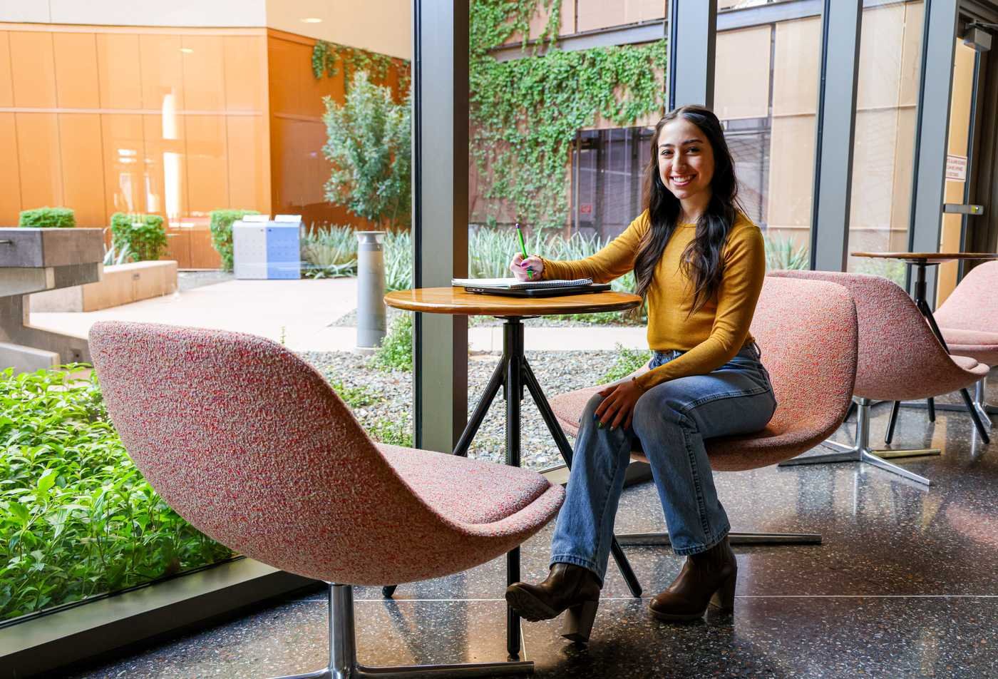 A student studies on campus, demonstrating flexible learning in the certificate in Social Transformation.