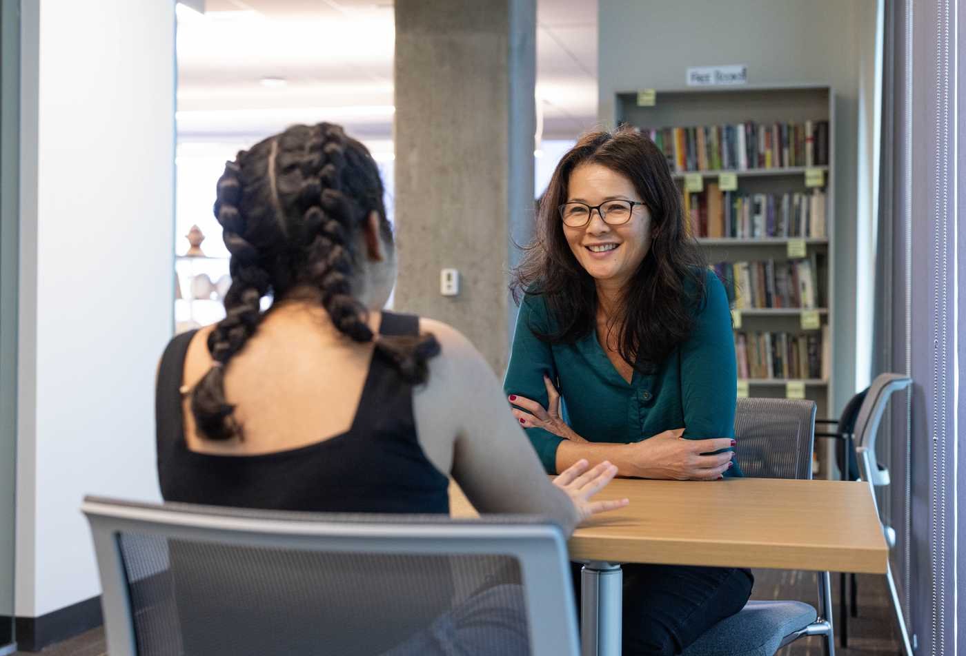 Professor Heather Switzer teaching a gender studies course to a group of students, demonstrating expertise in the MA in Gender Studies.