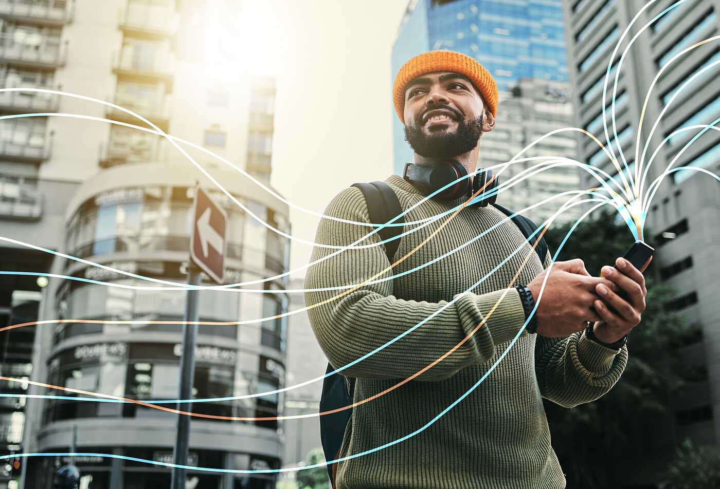 A person uses connected technology in a city, exploring innovation in ASU's Science, Technology and Society, BS program.