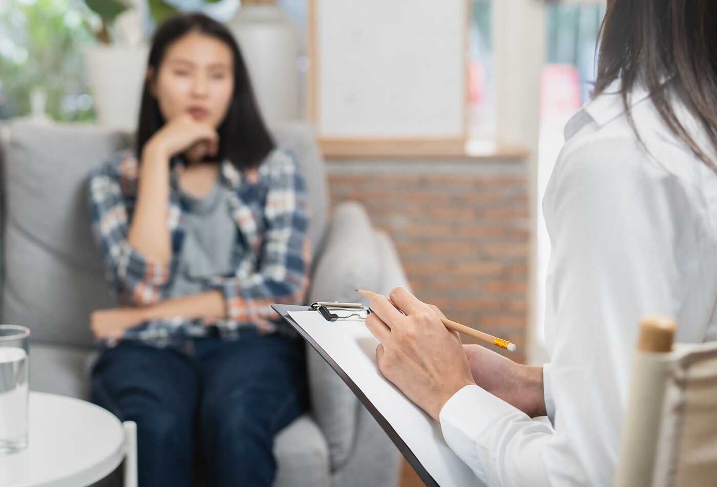 A counselor listens during a one-on-one session, reflecting the field explored in ASU's Counseling and Applied Psychological Science, BS program.
