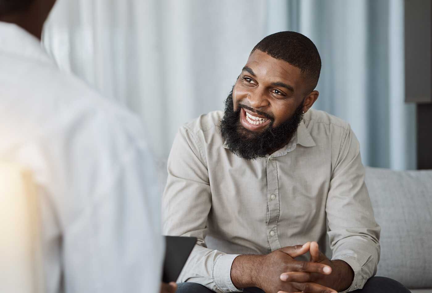A client speaks with a counselor, reflecting the study of human behavior in ASU's Psychology, BA program.