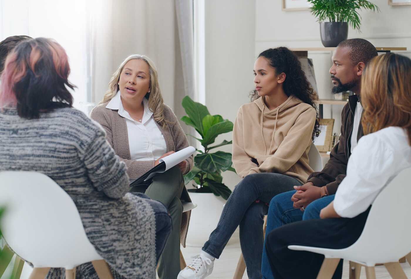 A group participates in a guided discussion, exploring human behavior in ASU's Psychology minor.