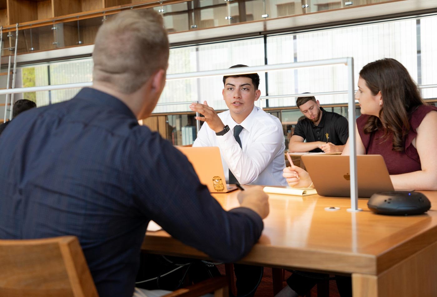 Students analyzing legal concepts while working collaboratively in ASU's Intellectual Property Law program.