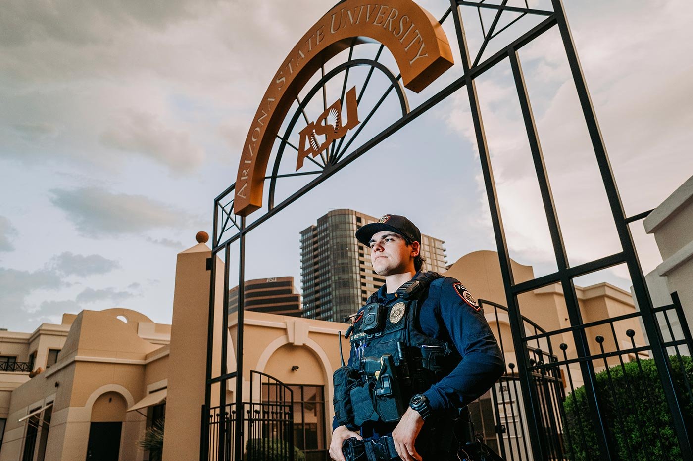 A security officer stands outside ASU's campus, reflecting the community safety focus of this Criminal Justice concentration.