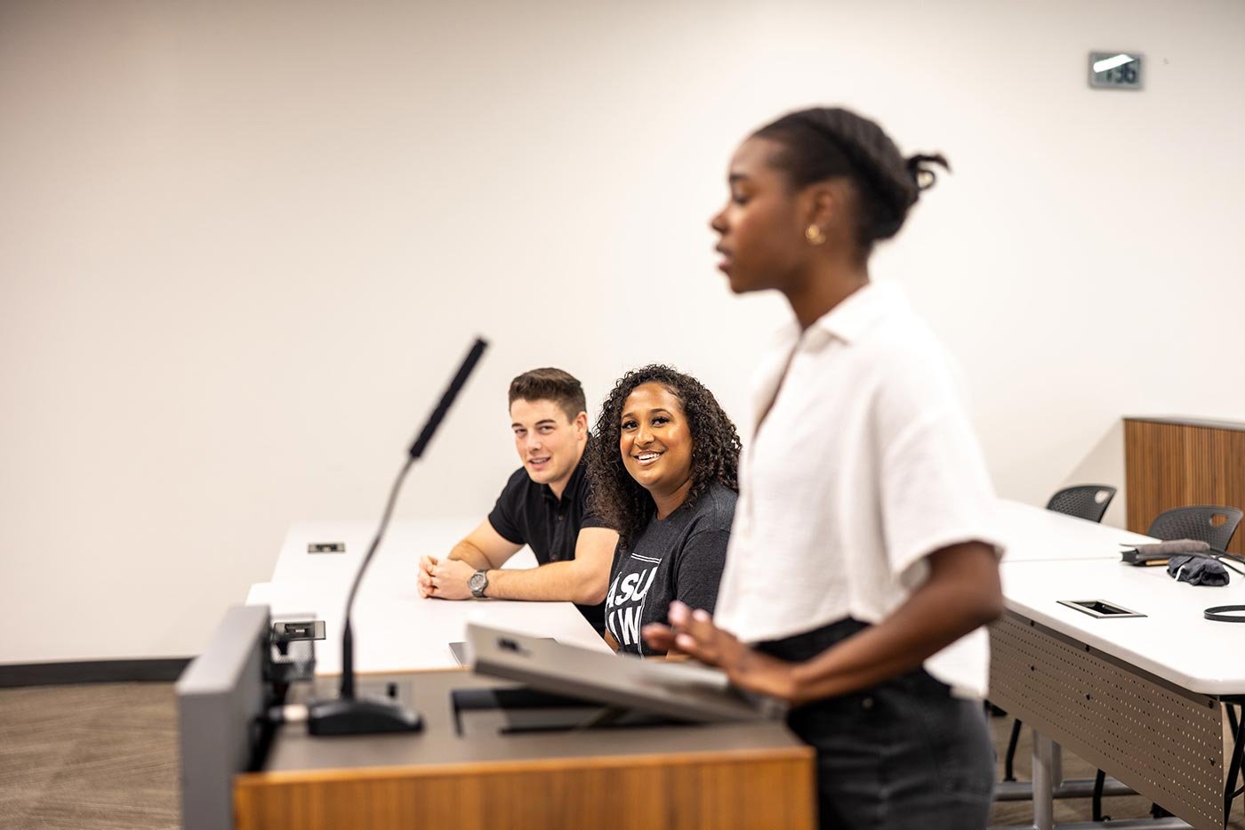 Students engage in a classroom presentation, showcasing collaborative learning in ASU’s Public Service and Public Policy (Criminology) degree.