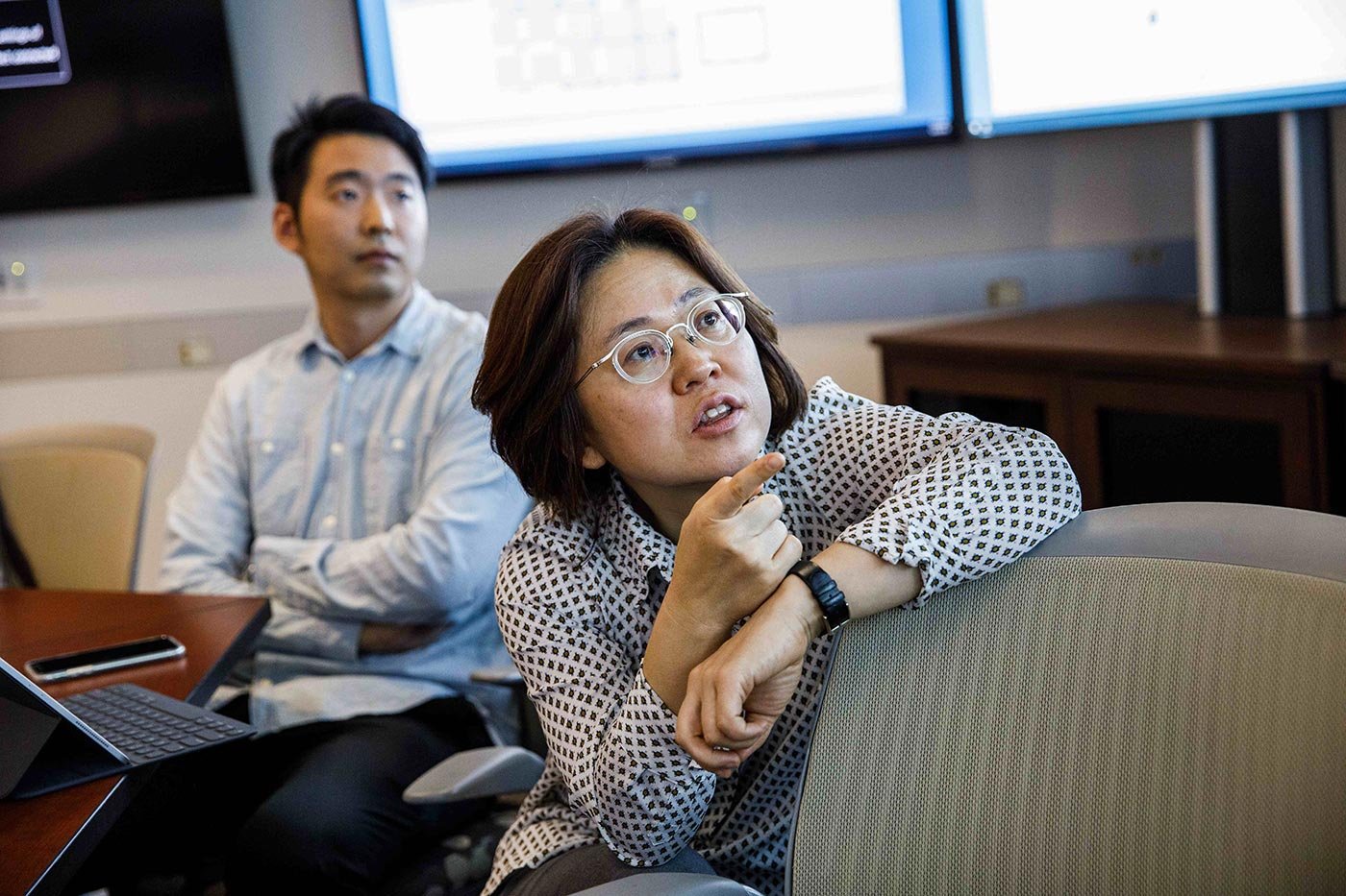 Students engage in a discussion during a meeting, highlighting collaboration in ASU's MS in Program Evaluation and Data Analytics.